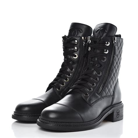 chanel long black boots|Chanel black combat boots.